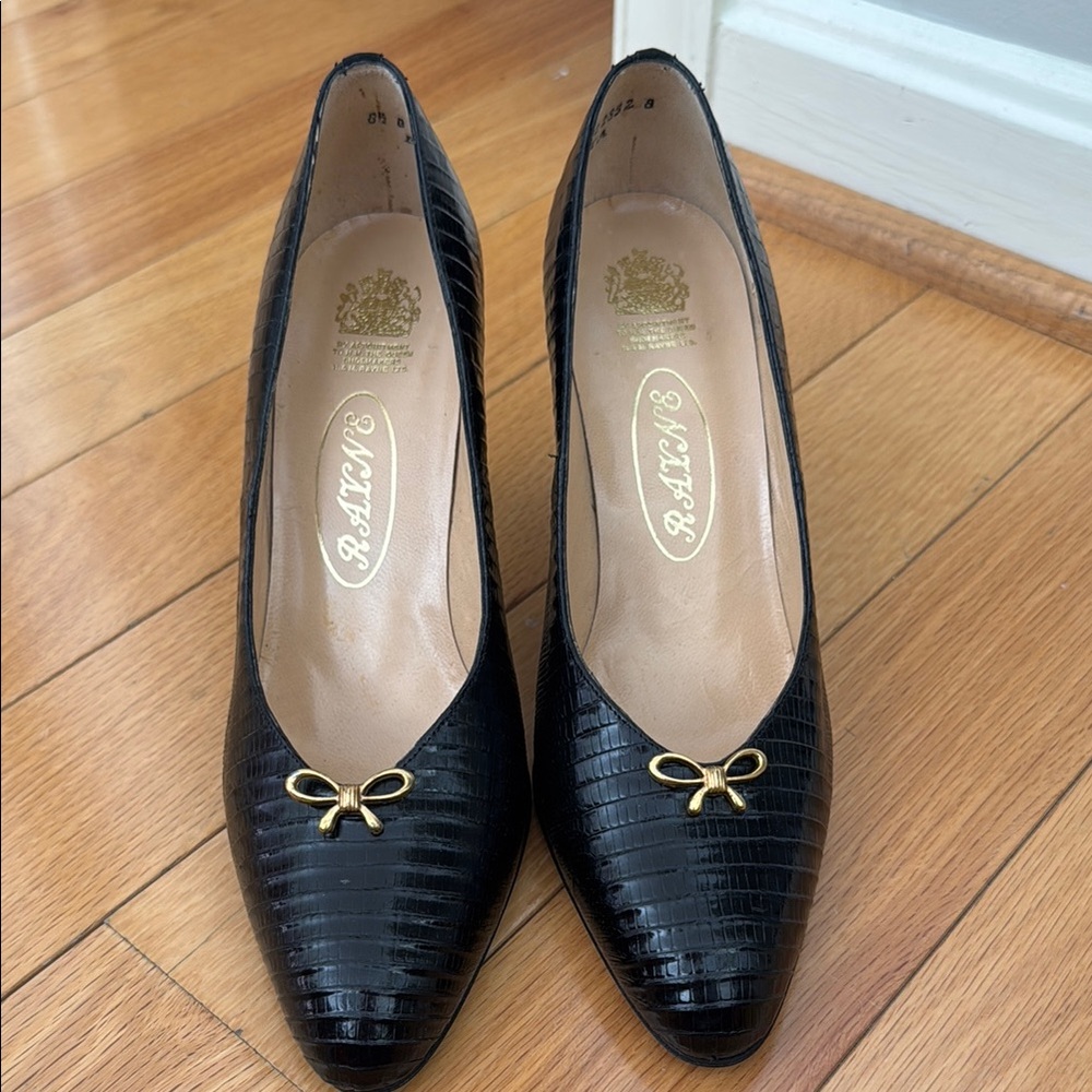 Elegant Black Leather Rayne Heels with Gold Bow Accents